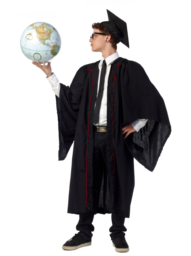 male student holding a globe